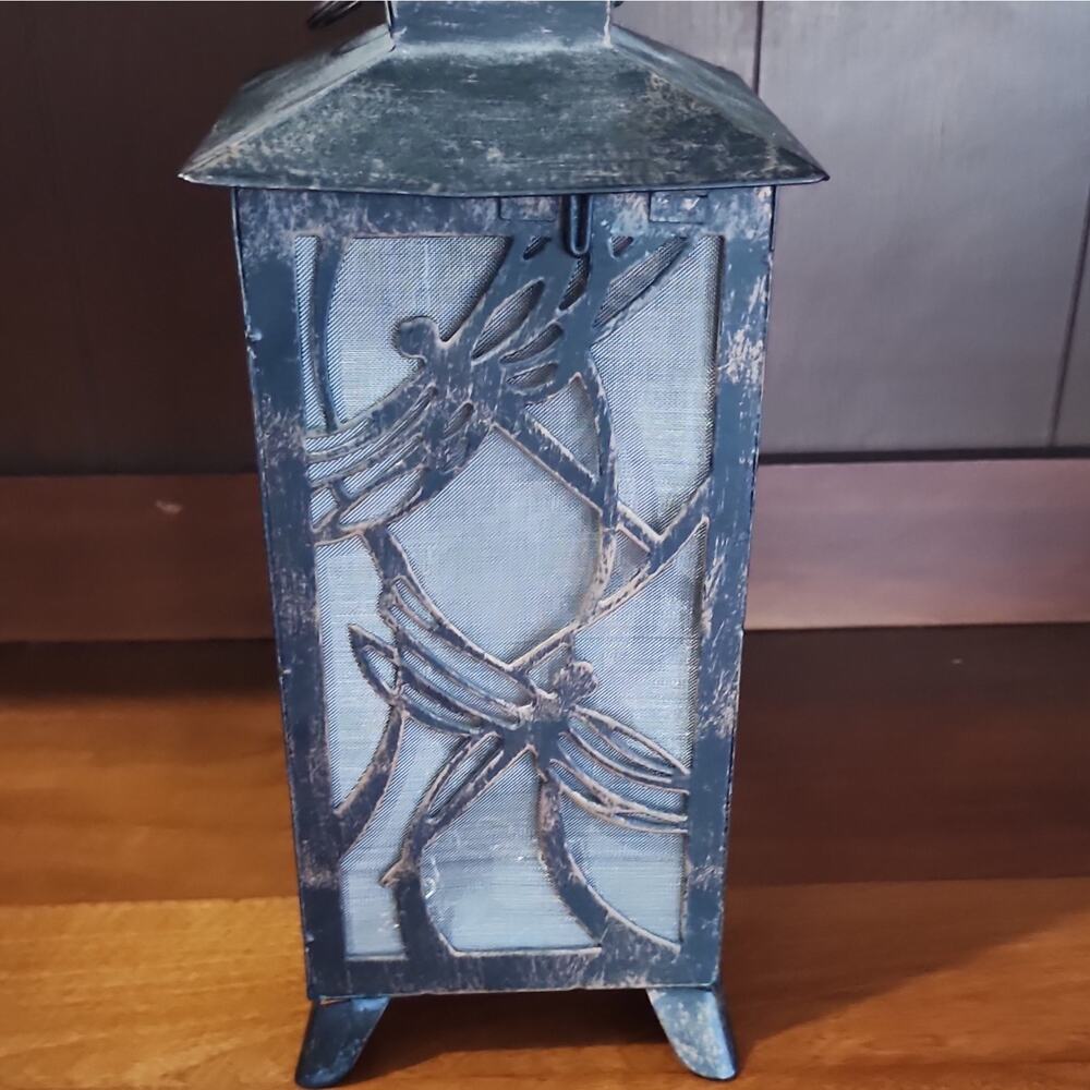 Unmarked Black Metal Dragonfly Lantern